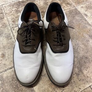 Men’s foot joy, saddle golf shoes. Size 7.